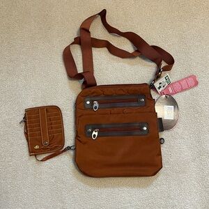 Brand new with tags Mosey Sidewinder crossbody bag
